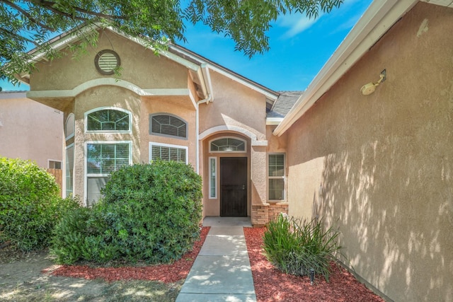 6674 E Alta Ave, Fresno, CA 93727 - doorway to property with stucco siding