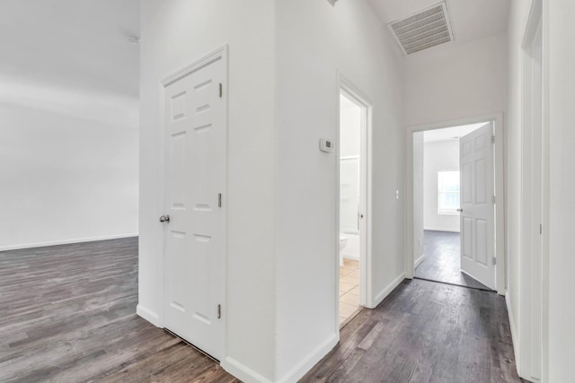 6674 E Alta Ave, Fresno, CA 93727 - hall with wood finished floors and baseboards