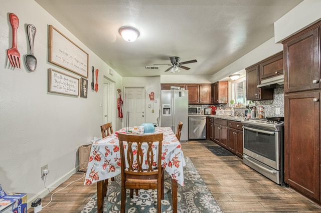 1431 N Willow Ave, Fresno, CA 93727 - dining room featuring a ceiling fan and dark wood-style flooring