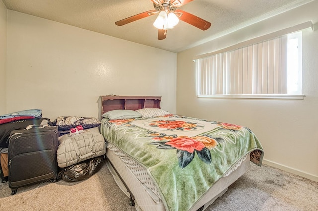 1431 N Willow Ave, Fresno, CA 93727 - carpeted bedroom featuring a ceiling fan and baseboards