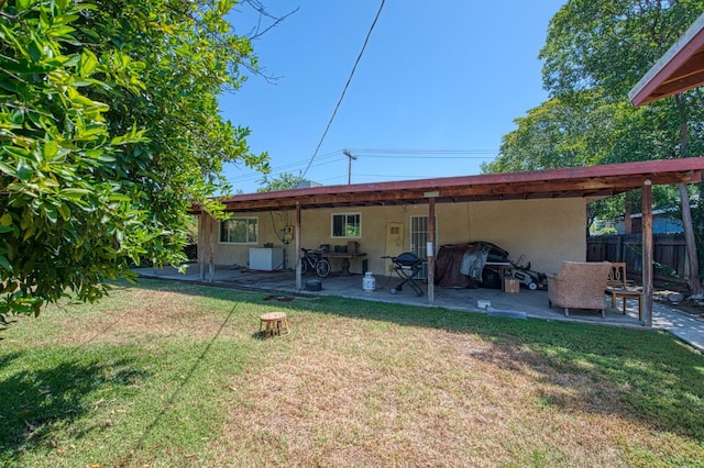 1431 N Willow Ave, Fresno, CA 93727 - rear view of property featuring a patio area and stucco siding