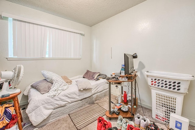 1431 N Willow Ave, Fresno, CA 93727 - carpeted bedroom with a textured ceiling and baseboards