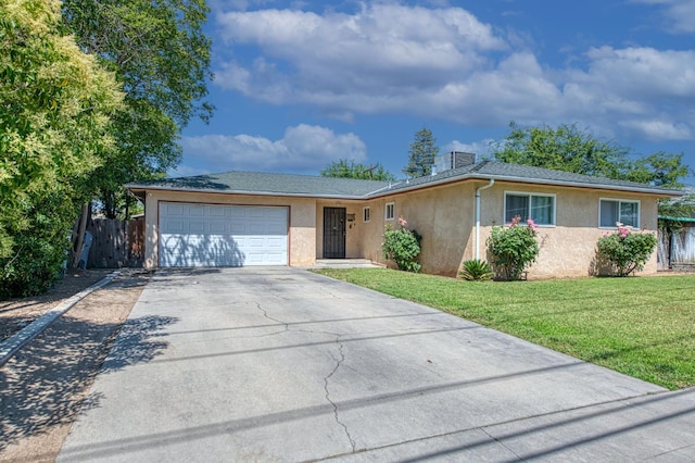 1431 N Willow Ave, Fresno, CA 93727 - ranch-style home featuring stucco siding, an attached garage, and driveway