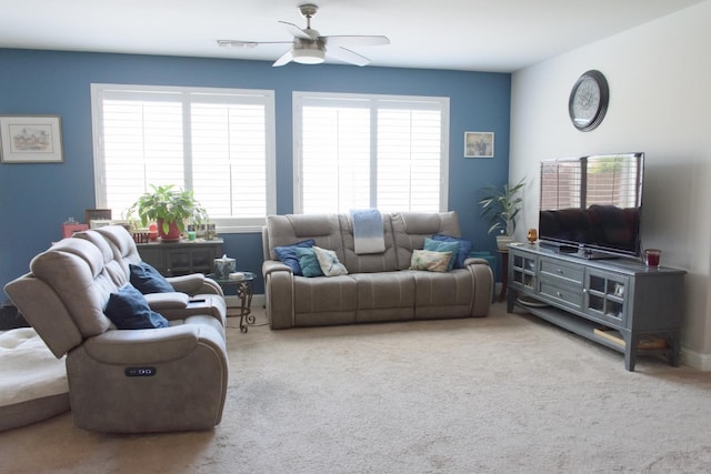 6379 W Northdale Ave, Fresno, CA 93723 - carpeted living room featuring a ceiling fan, healthy amount of natural light, and baseboards