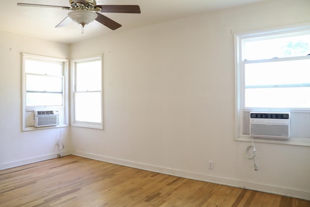 1020 E Saginaw Way, Fresno, CA 93704 - spare room with light wood-type flooring, cooling unit, and healthy amount of natural light