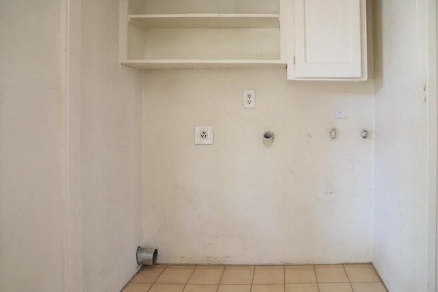 1020 E Saginaw Way, Fresno, CA 93704 - laundry area with gas dryer hookup, electric dryer hookup, and light tile patterned floors