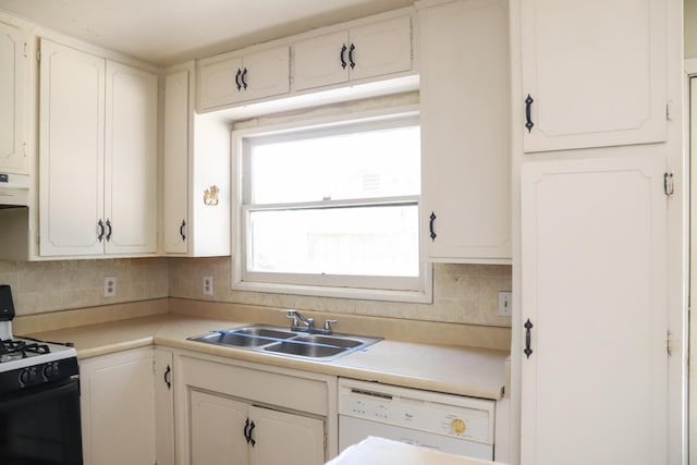 1020 E Saginaw Way, Fresno, CA 93704 - kitchen featuring stove, dishwasher, decorative backsplash, and white cabinets