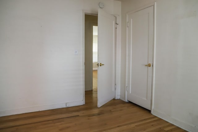 1020 E Saginaw Way, Fresno, CA 93704 - unfurnished room with wood finished floors and a smoke detector