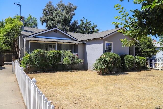 1020 E Saginaw Way, Fresno, CA 93704 - view of front of house with stucco siding, a chimney, and roof with shingles