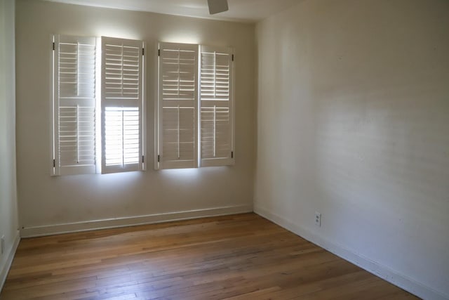 1020 E Saginaw Way, Fresno, CA 93704 - empty room with hardwood / wood-style floors and baseboards