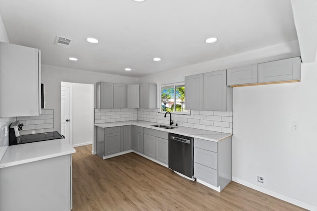 3877 N Ezie, Fresno, CA 93727 - kitchen with dishwasher, range, a sink, gray cabinetry, and light wood-type flooring