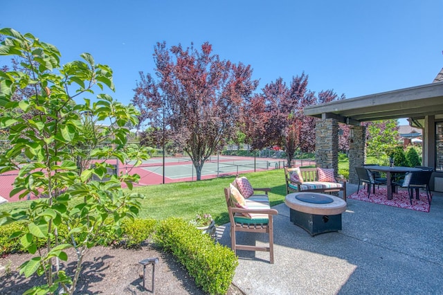 6772 N Wembley Dr, Fresno, CA 93711 - view of yard featuring a tennis court and an outdoor fire pit