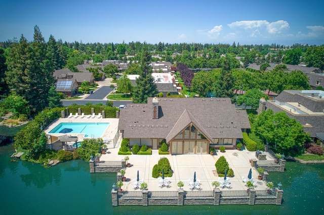 6772 N Wembley Dr, Fresno, CA 93711 - aerial perspective of suburban area with a nearby body of water