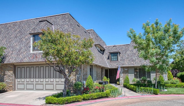 6772 N Wembley Dr, Fresno, CA 93711 - view of front of house with stone siding and driveway