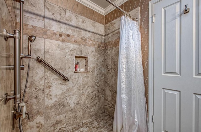 6772 N Wembley Dr, Fresno, CA 93711 - bathroom featuring a tile shower and ornamental molding