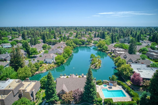 6772 N Wembley Dr, Fresno, CA 93711 - aerial perspective of suburban area featuring a large body of water and a pool