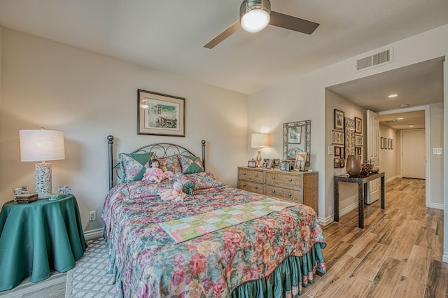6772 N Wembley Dr, Fresno, CA 93711 - bedroom featuring wood finished floors, baseboards, and ceiling fan