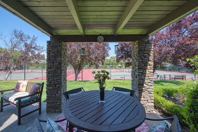 6772 N Wembley Dr, Fresno, CA 93711 - view of patio with a tennis court and outdoor dining area
