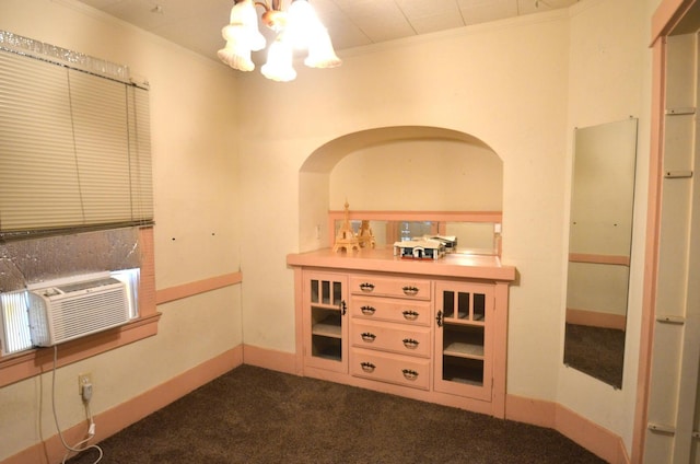 1605 N Arthur Ave, Fresno, CA 93705 - bar area with a chandelier, dark colored carpet, crown molding, arched walkways, and cooling unit