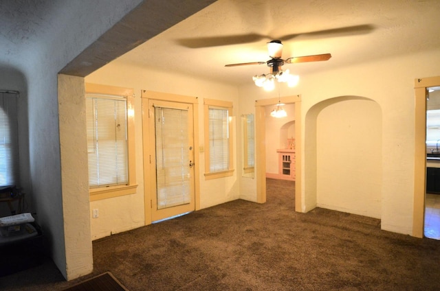 1605 N Arthur Ave, Fresno, CA 93705 - carpeted entrance foyer with arched walkways and a ceiling fan