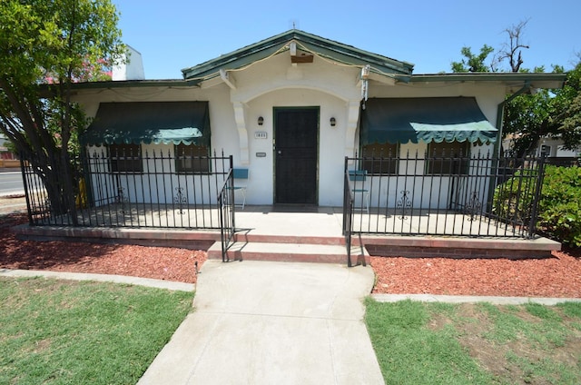 1605 N Arthur Ave, Fresno, CA 93705 - view of front of house with stucco siding