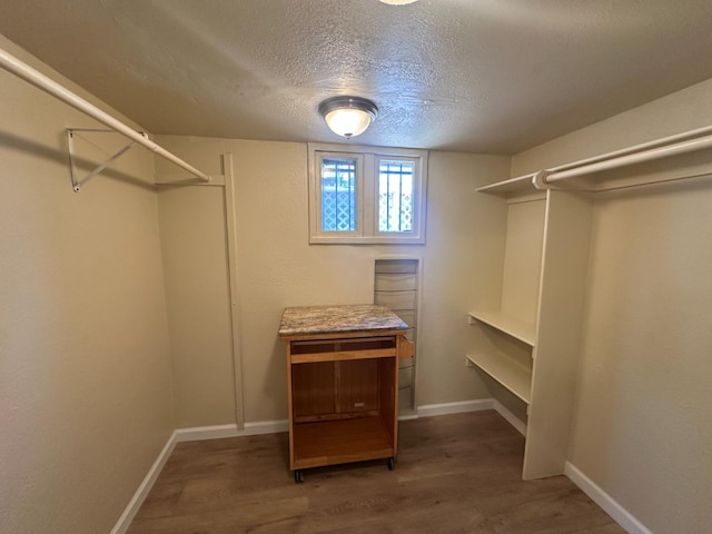 3023 E White Ave, Fresno, CA 93701 - walk in closet with wood finished floors