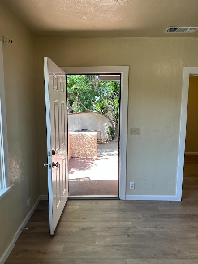 3023 E White Ave, Fresno, CA 93701 - entrance foyer with wood finished floors and baseboards