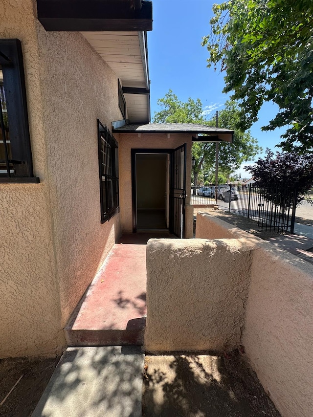 3023 E White Ave, Fresno, CA 93701 - view of side of home featuring stucco siding