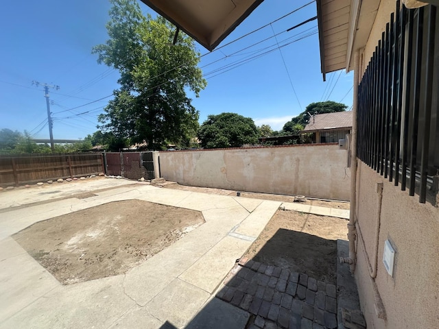 3023 E White Ave, Fresno, CA 93701 - fenced backyard featuring a patio