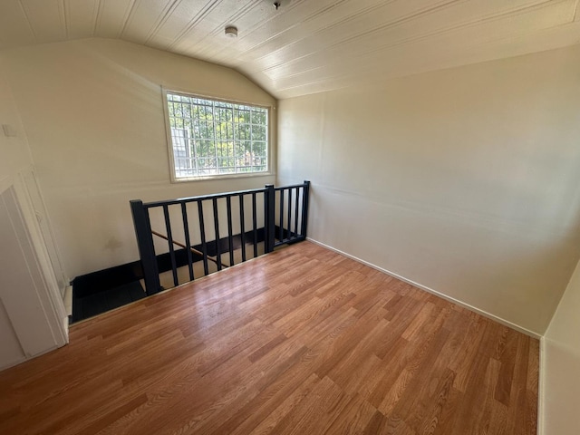 3023 E White Ave, Fresno, CA 93701 - stairway with lofted ceiling and wood finished floors