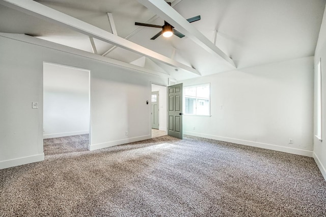 17367 Camden Dr, Madera, CA 93638 - empty room with beam ceiling, baseboards, carpet floors, ceiling fan, and high vaulted ceiling