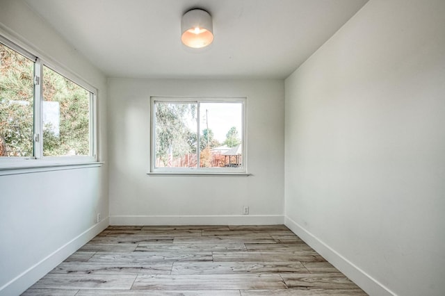 17367 Camden Dr, Madera, CA 93638 - spare room featuring baseboards and light wood finished floors