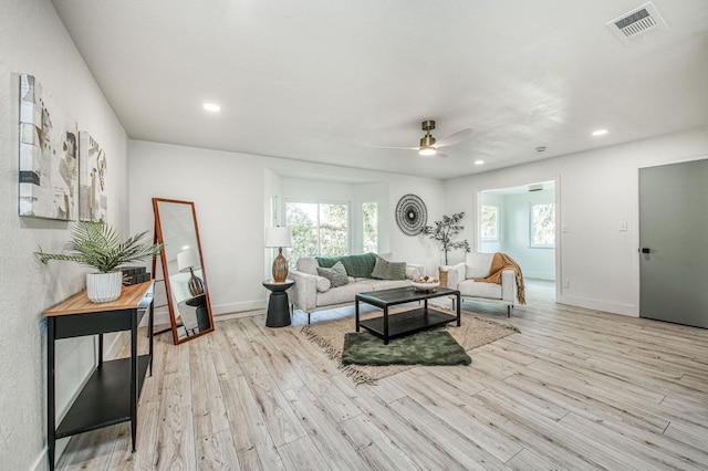 17367 Camden Dr, Madera, CA 93638 - living room featuring ceiling fan, wood finished floors, plenty of natural light, baseboards, and recessed lighting