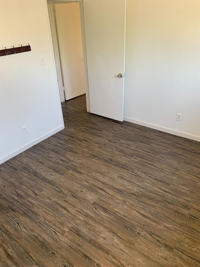3127 E Mckenzie, Fresno, CA 93702 - empty room with dark wood-style flooring and baseboards