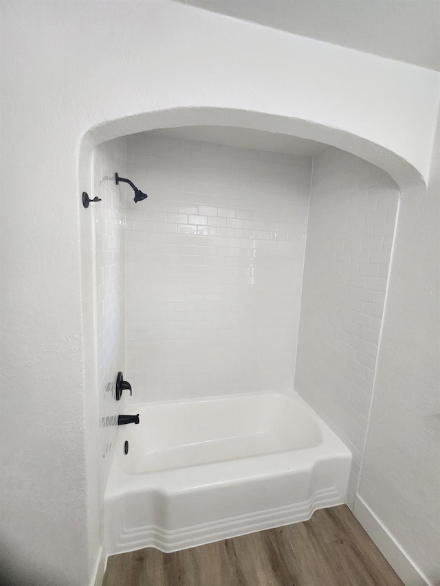 4754 E Andrews Ave, Fresno, CA 93726 - full bathroom with wood finished floors, baseboards, and  shower combination