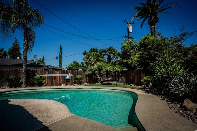 1720 W Barstow Ave, Fresno, CA 93711 - view of pool with a fenced backyard and a patio