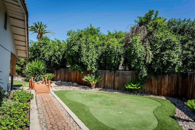 1720 W Barstow Ave, Fresno, CA 93711 - fenced yard with an area to practice putting