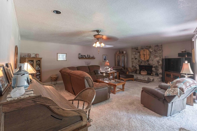 1720 W Barstow Ave, Fresno, CA 93711 - living room featuring light carpet, a textured ceiling, ceiling fan, and a fireplace