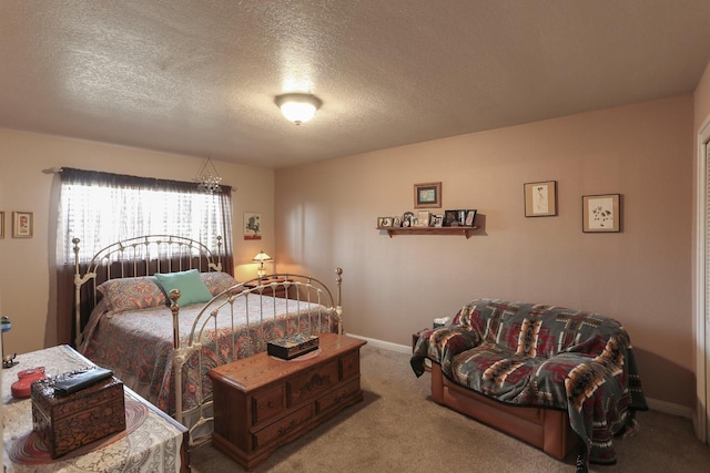 1720 W Barstow Ave, Fresno, CA 93711 - carpeted bedroom with a textured ceiling and baseboards
