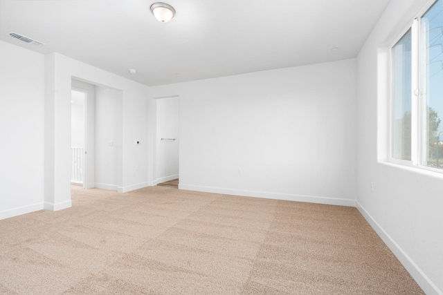 2054 N Laverne Ave, Fresno, CA 93727 - spare room with light carpet and baseboards