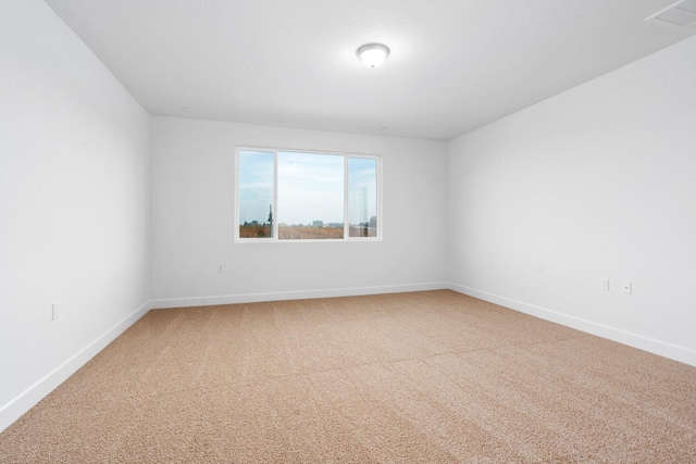 2054 N Laverne Ave, Fresno, CA 93727 - unfurnished room with light colored carpet and baseboards