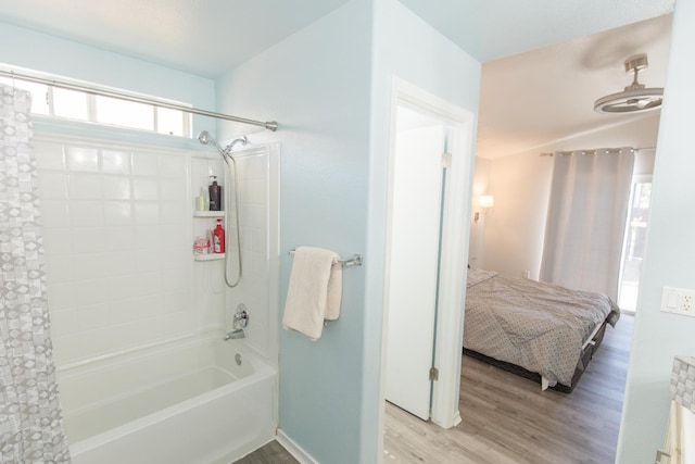 6412 E Inyo St, Fresno, CA 93727 - bathroom featuring shower / tub combo with curtain, ensuite bath, wood finished floors, and radiator heating unit
