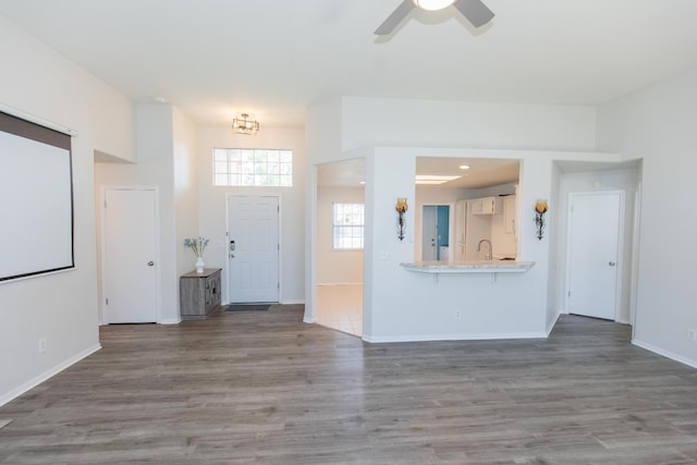 6412 E Inyo St, Fresno, CA 93727 - foyer featuring wood finished floors, baseboards, and ceiling fan