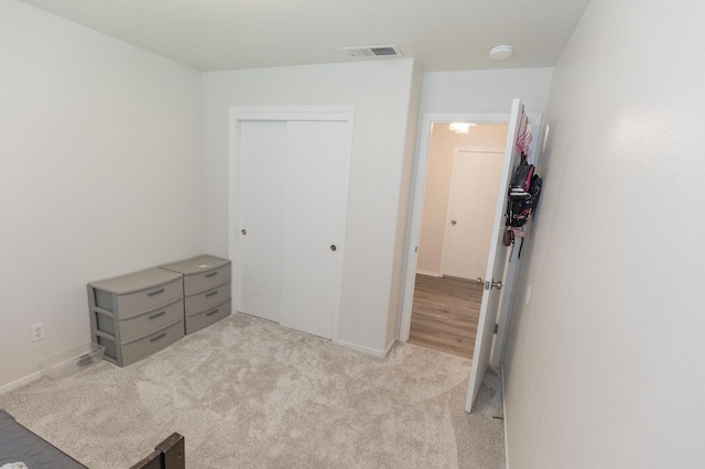 6412 E Inyo St, Fresno, CA 93727 - unfurnished bedroom featuring carpet flooring, a closet, and baseboards