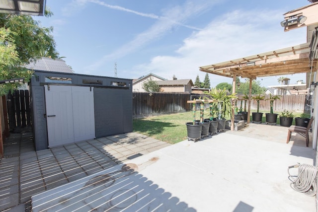 6412 E Inyo St, Fresno, CA 93727 - fenced backyard with a pergola and a patio area