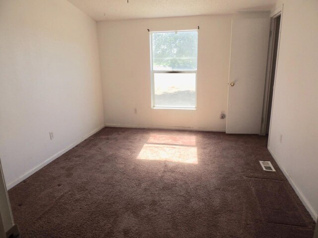 15716 S Hughes, Caruthers, CA 93609 - carpeted empty room with baseboards