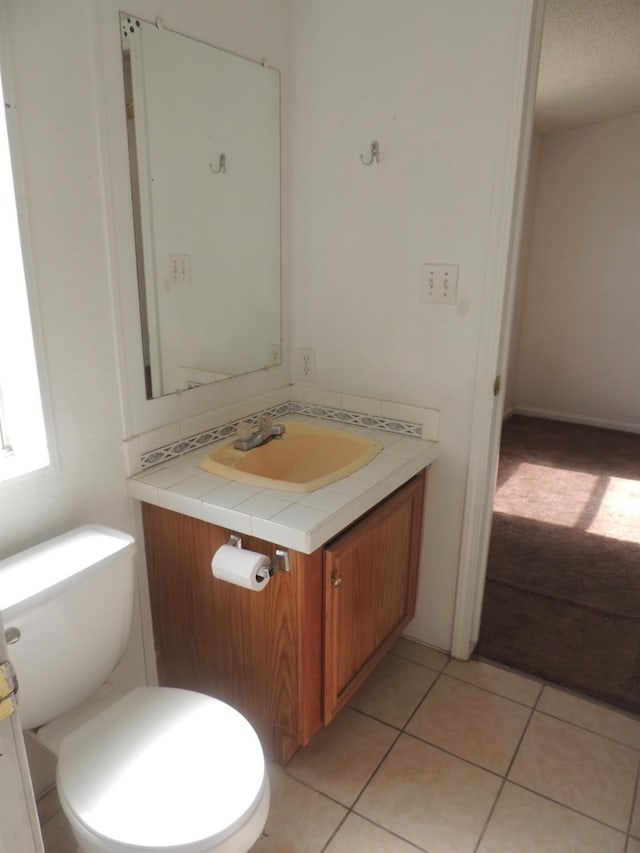 15716 S Hughes, Caruthers, CA 93609 - half bath featuring vanity and tile patterned flooring