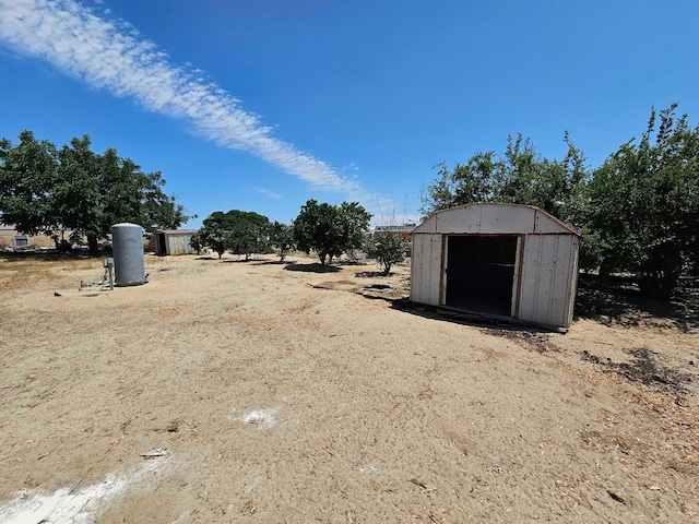 15716 S Hughes, Caruthers, CA 93609 - view of yard with a storage unit
