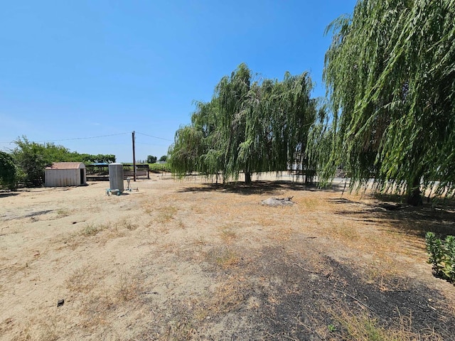 15716 S Hughes, Caruthers, CA 93609 - view of yard with a shed and a view of rural / pastoral area
