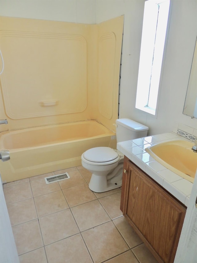 15716 S Hughes, Caruthers, CA 93609 - full bath featuring vanity, tile patterned flooring, and shower / washtub combination